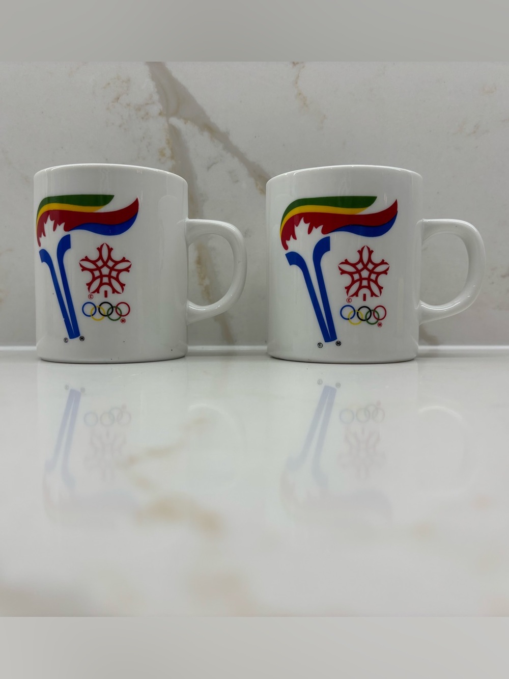 Vintage Pair of White 1988 Calgary Winter Olympic Torch Relay Logo Coffee Mugs